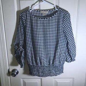 black and white patterned blouse
